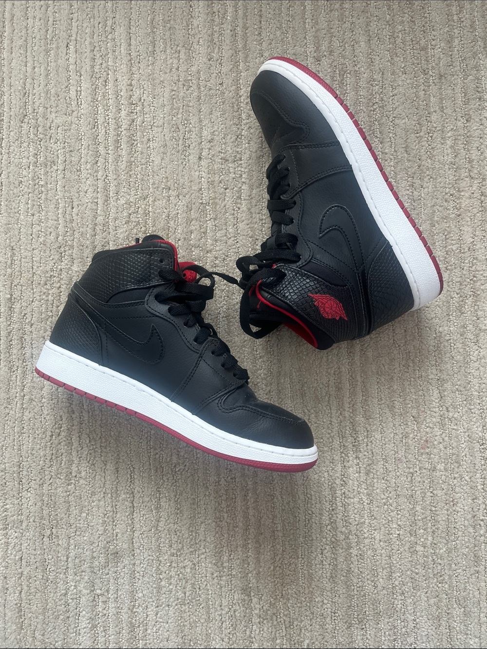 Jordan Kids Black and Red High-Top Sneakers, size 5Y